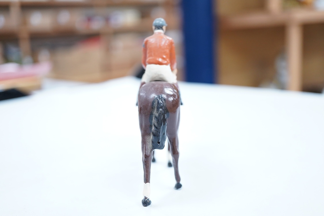 Two boxed Britains Racing Colours of Famous Owners series lead mounted figures; Miss Dorothy Paget - rider in yellow-striped blue jersey on a grey horse, and Msr. M. Boussac - rider in orange jersey on a dark brown horse
